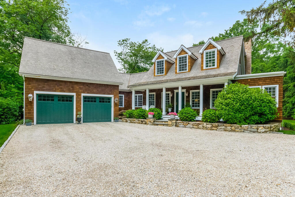 327 Middlesex Road Darien, CT 06820 - Photo 2 of 40 front view of house with a yard