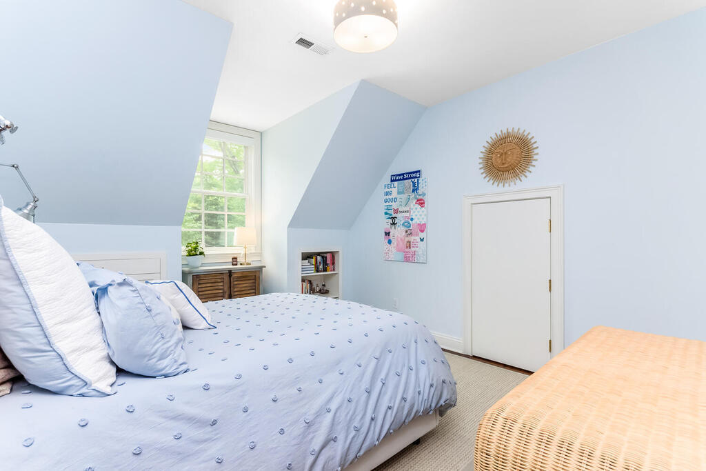 327 Middlesex Road Darien, CT 06820 - Photo 26 of 40 a bedroom with a bed and a window