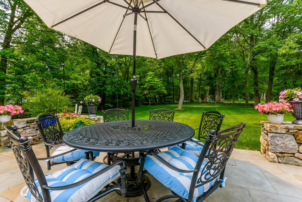 327 Middlesex Road Darien, CT 06820 - Photo 33 of 40 a view of an chairs and table in the patio