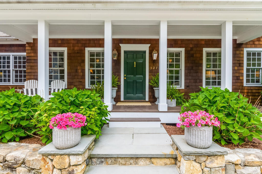 327 Middlesex Road Darien, CT 06820 - Photo 4 of 40 a flower pots in front of the house