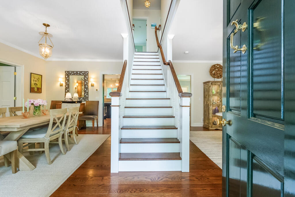 327 Middlesex Road Darien, CT 06820 - Photo 5 of 40 a view of a dining room with furniture and wooden floor