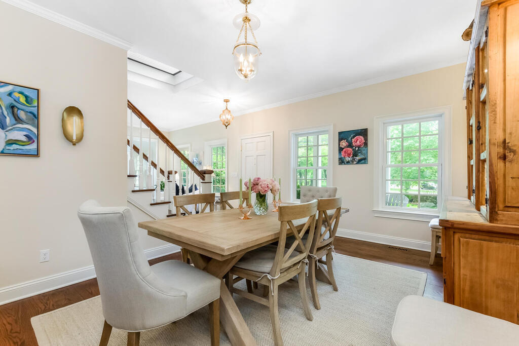 327 Middlesex Road Darien, CT 06820 - Photo 9 of 40 a view of a dining room with furniture window and wooden floor