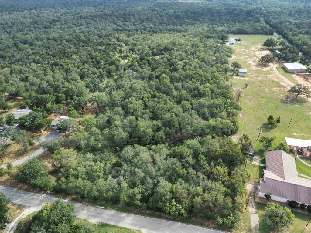 St-johns St Johns Road Dale, TX 78616 - Photo 5 of 14 an aerial view of residential houses with outdoor space and trees