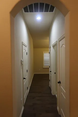 a living room with a couch and a view of living room