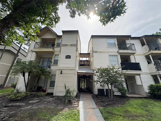 a view of a lake with a yard