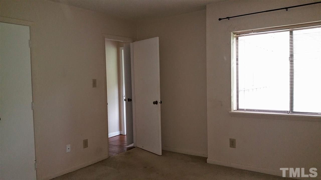 637 Pine Ridge Place, Unit 637 Raleigh, NC 27609 - Photo 8 of 14 a view of an empty room and a window