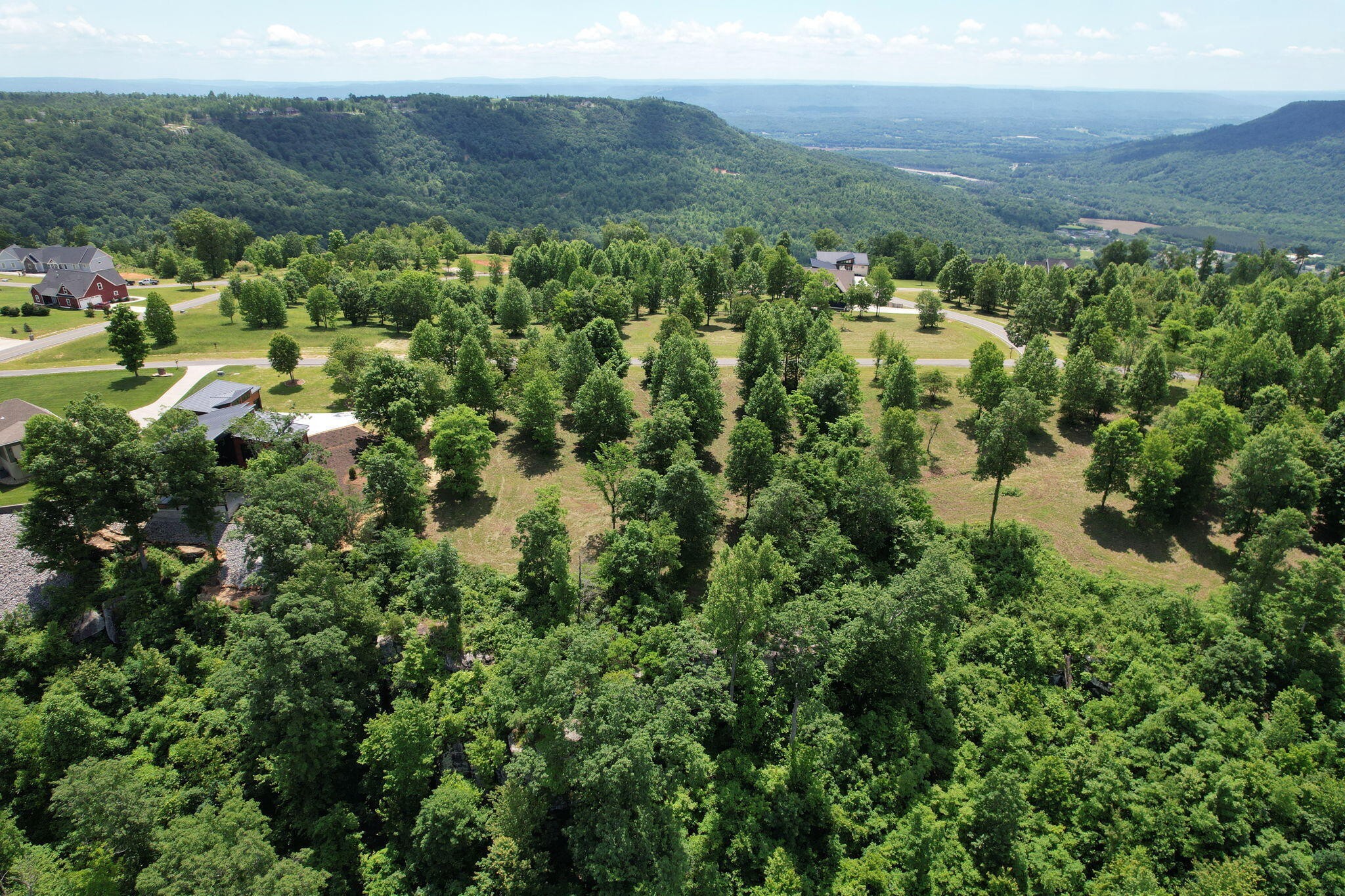 755 Sunset Circle Jasper, TN 37347 - Photo 24 of 44 an aerial view of residential house with outdoor space and trees all around