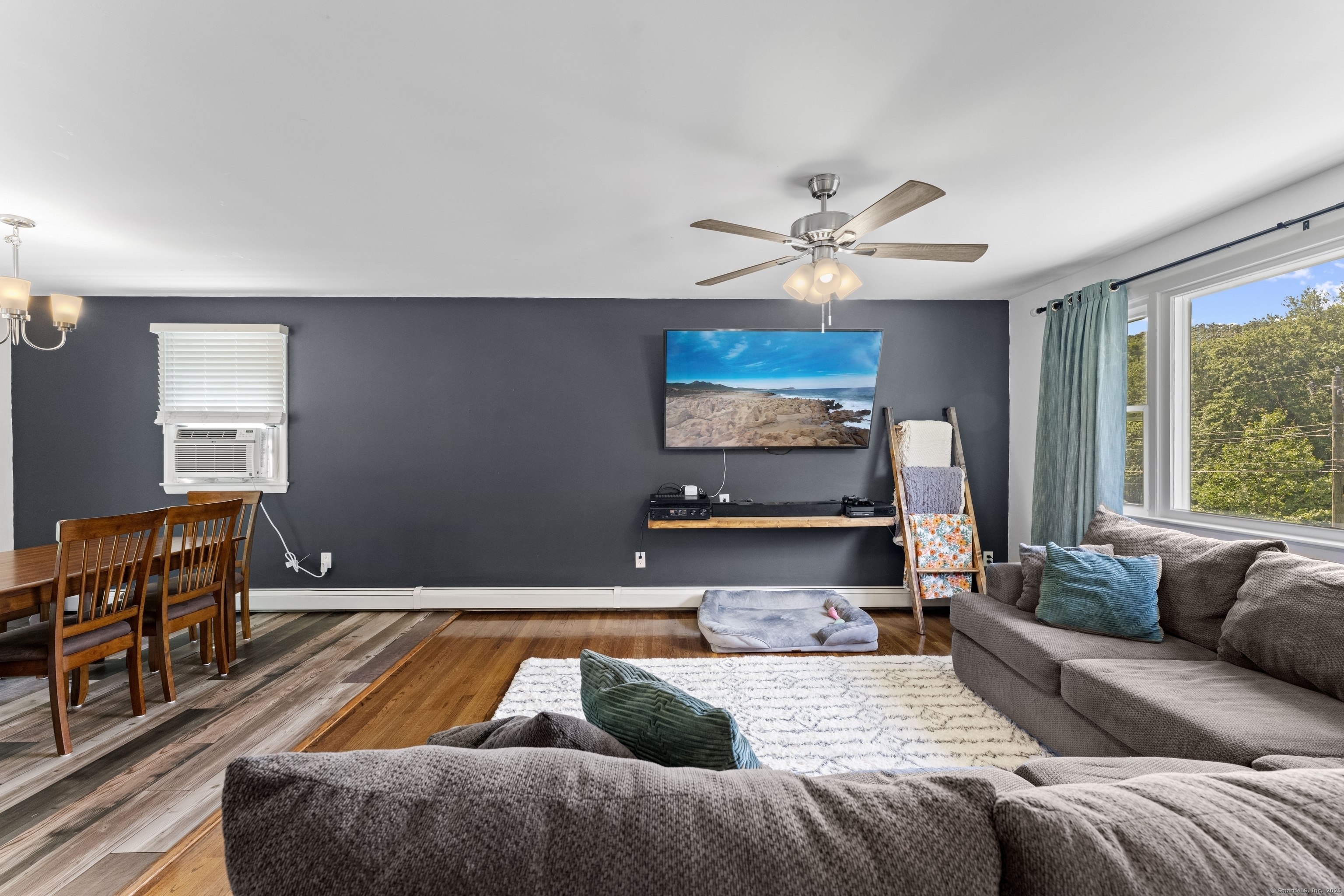 11 Willow Lane Ledyard, CT 06339 - Photo 11 of 39 a living room with furniture and a flat screen tv