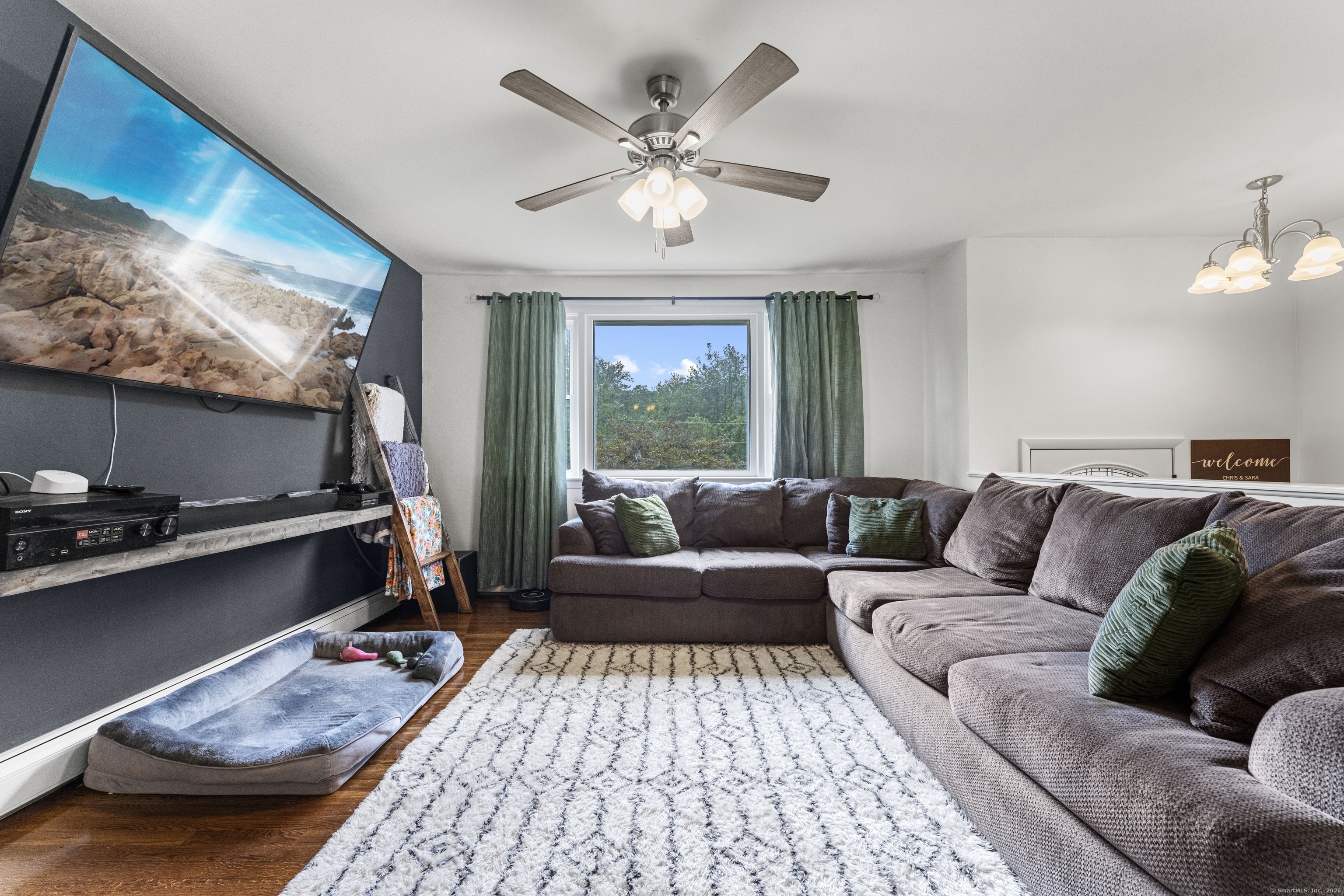 11 Willow Lane Ledyard, CT 06339 - Photo 13 of 39 a living room with furniture and a flat screen tv