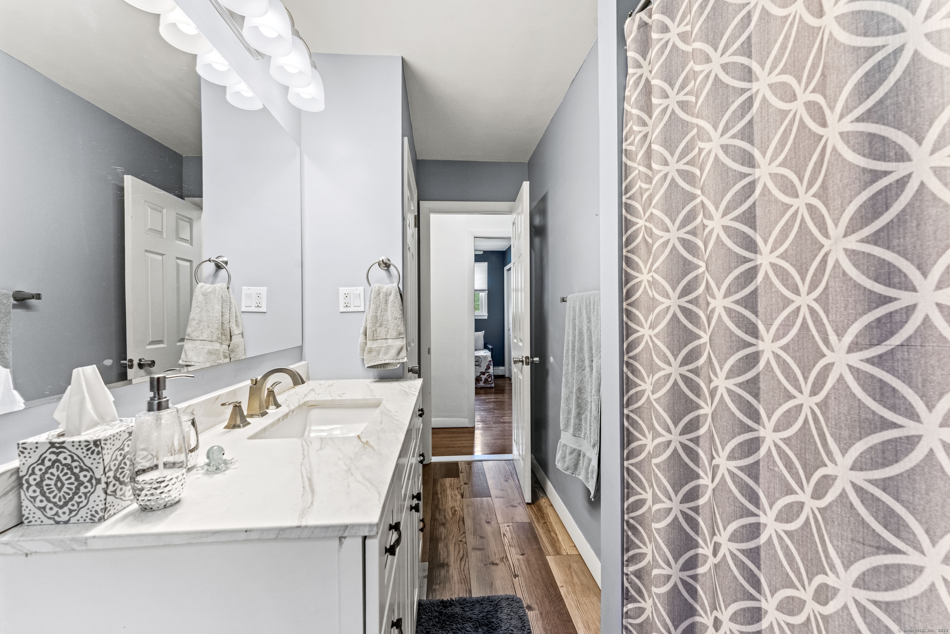 11 Willow Lane Ledyard, CT 06339 - Photo 14 of 39 a en suite bathroom with a sink and a mirror