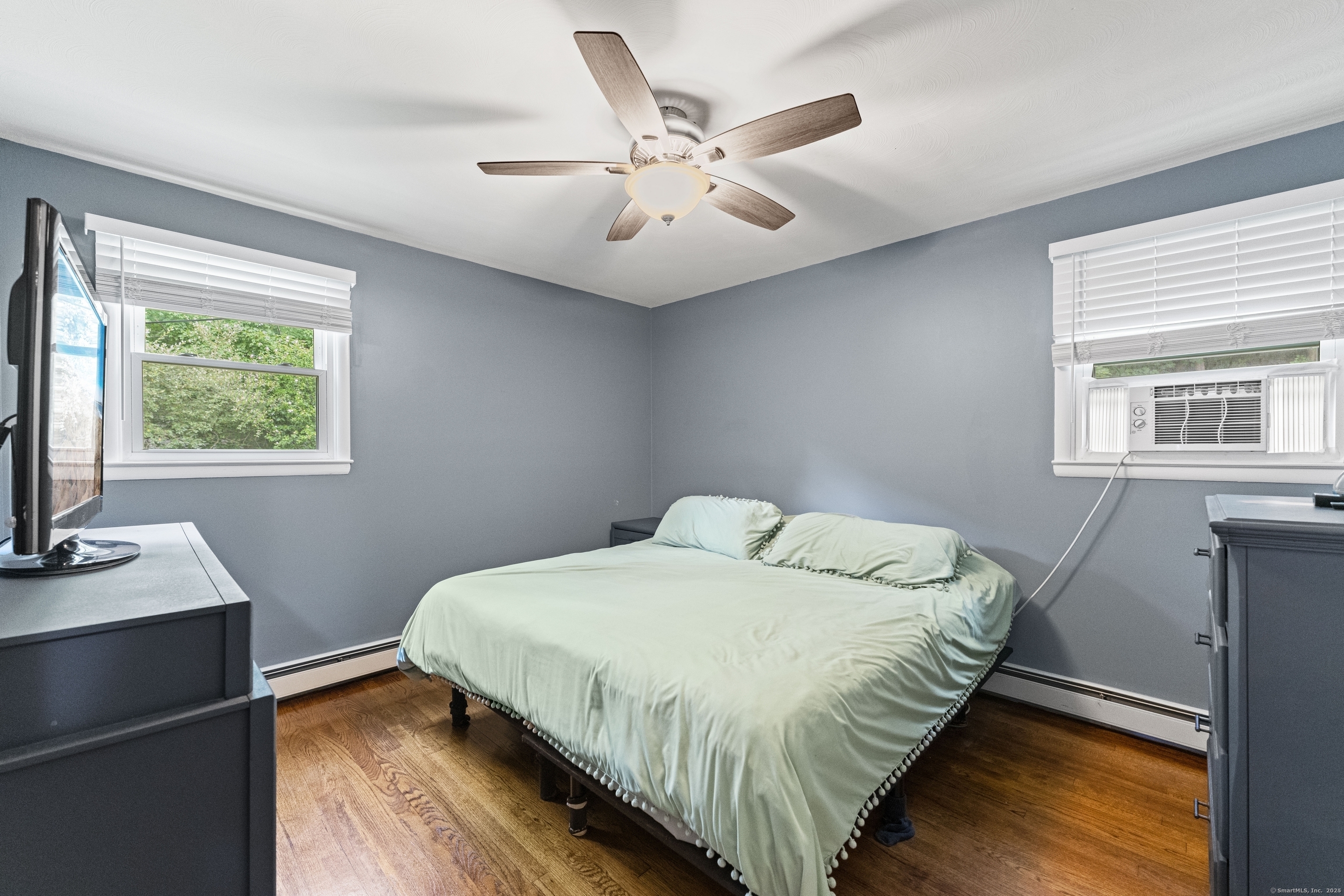 11 Willow Lane Ledyard, CT 06339 - Photo 16 of 39 a bedroom with a bed and a window