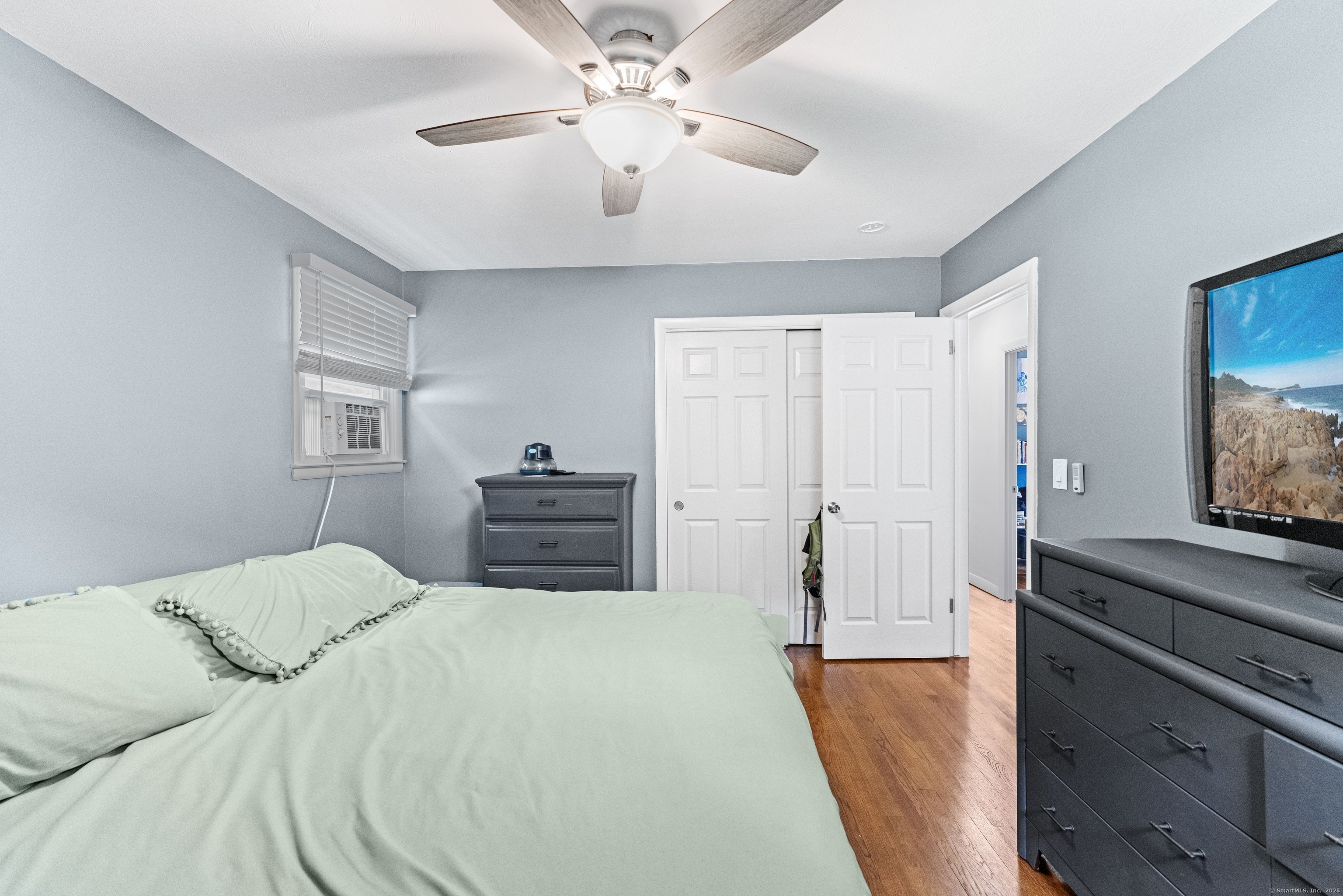 11 Willow Lane Ledyard, CT 06339 - Photo 17 of 39 a bedroom with a bed and a flat screen tv