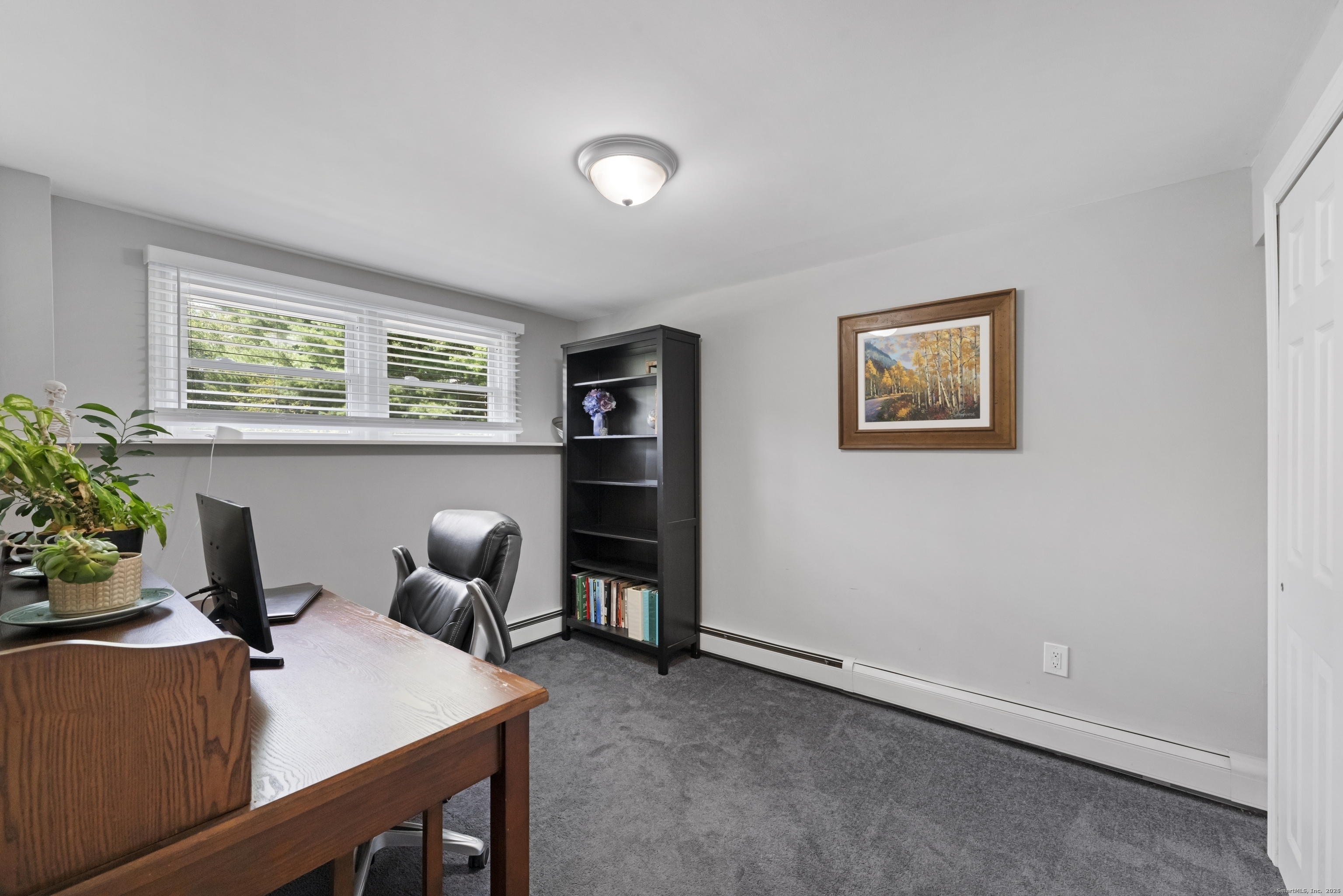 11 Willow Lane Ledyard, CT 06339 - Photo 24 of 39 a view of a workspace with furniture and a workspace