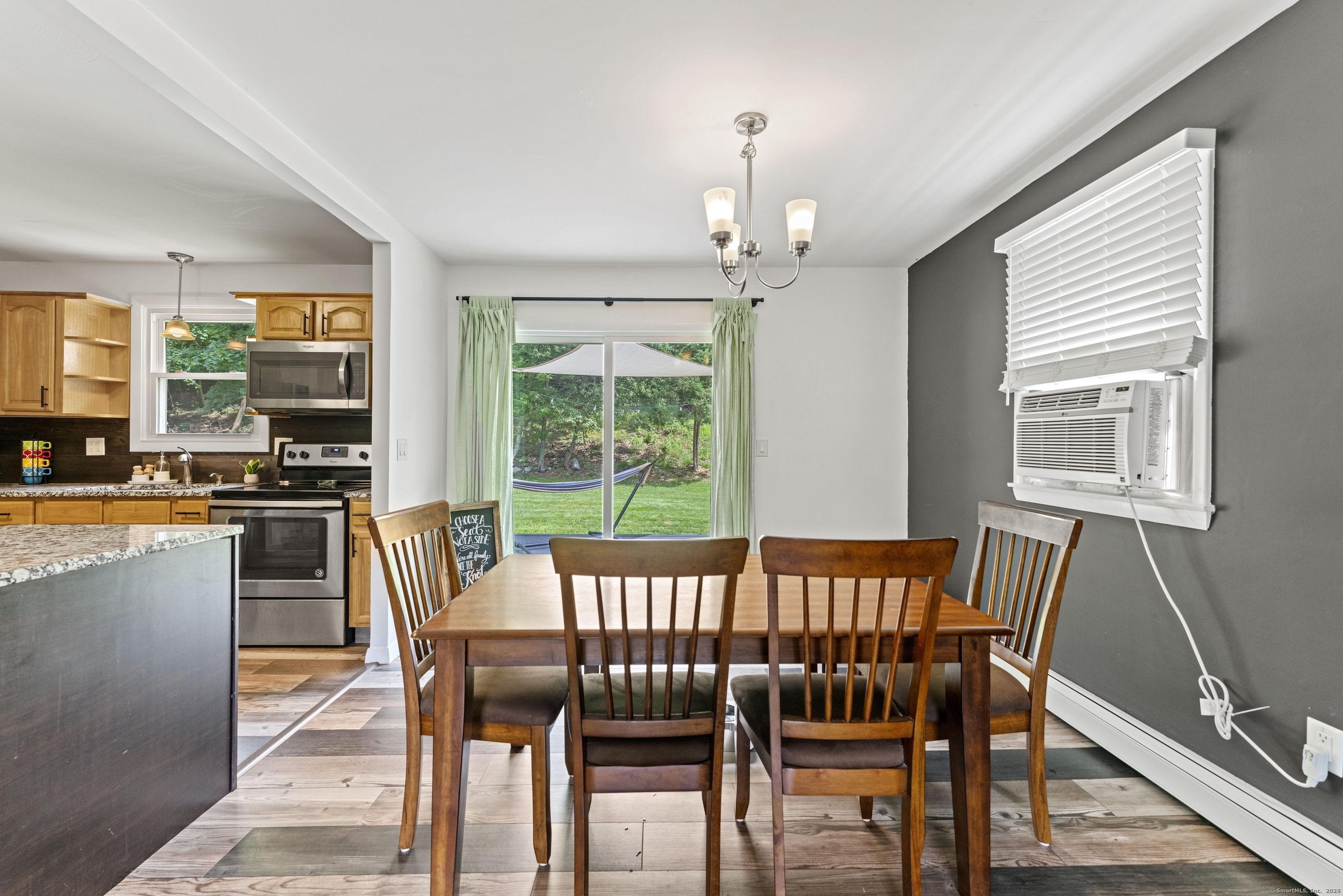11 Willow Lane Ledyard, CT 06339 - Photo 8 of 39 a view of a dining room with furniture window and outside view