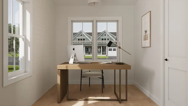 a view of a dining room with furniture and window