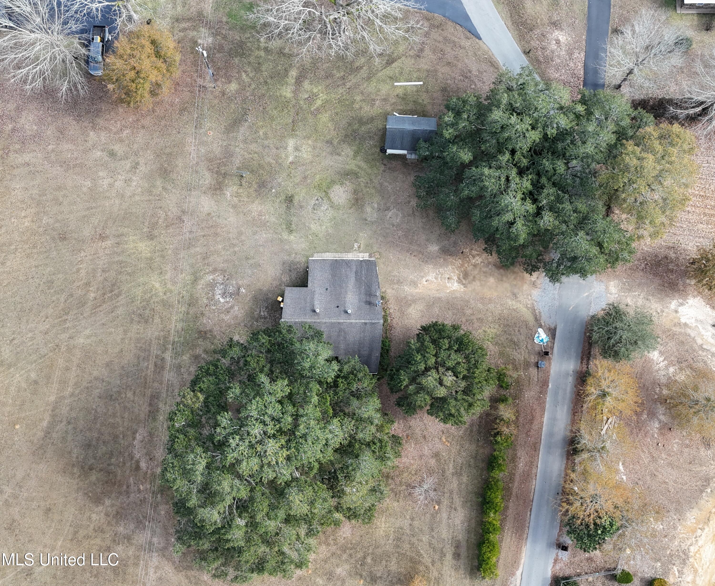 13266 Blue Meadows Road Pass Christian, MS 39571 - Photo 3 of 22 dji_fly_20251223_121422_0372_17665211987