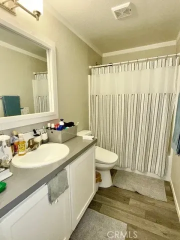 a view of a storage and utility room with washer and dryer