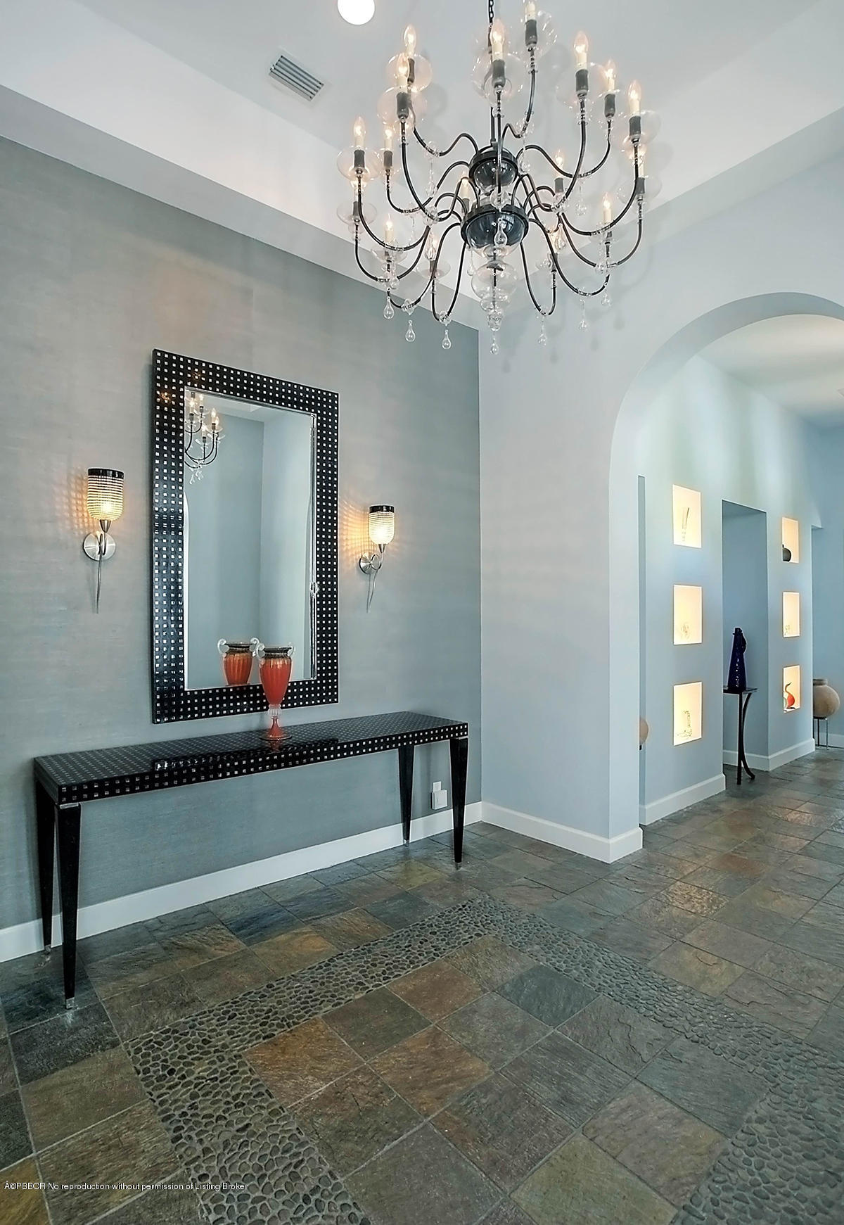 2570 Hampton Bridge Road Delray Beach, FL 33445 - Photo 3 of 40 a view of a room with a mirror and furniture