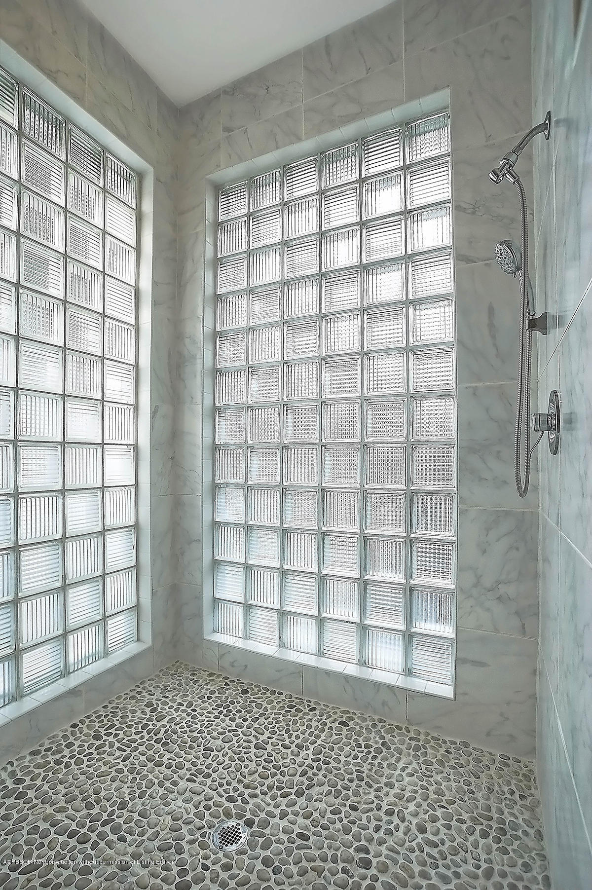 2570 Hampton Bridge Road Delray Beach, FL 33445 - Photo 23 of 40 a bathroom with a shower