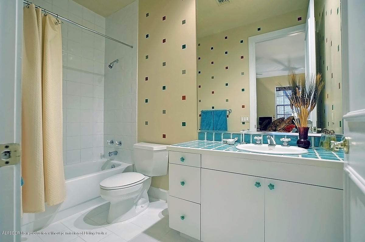 2570 Hampton Bridge Road Delray Beach, FL 33445 - Photo 25 of 40 a bathroom with a sink toilet and shower