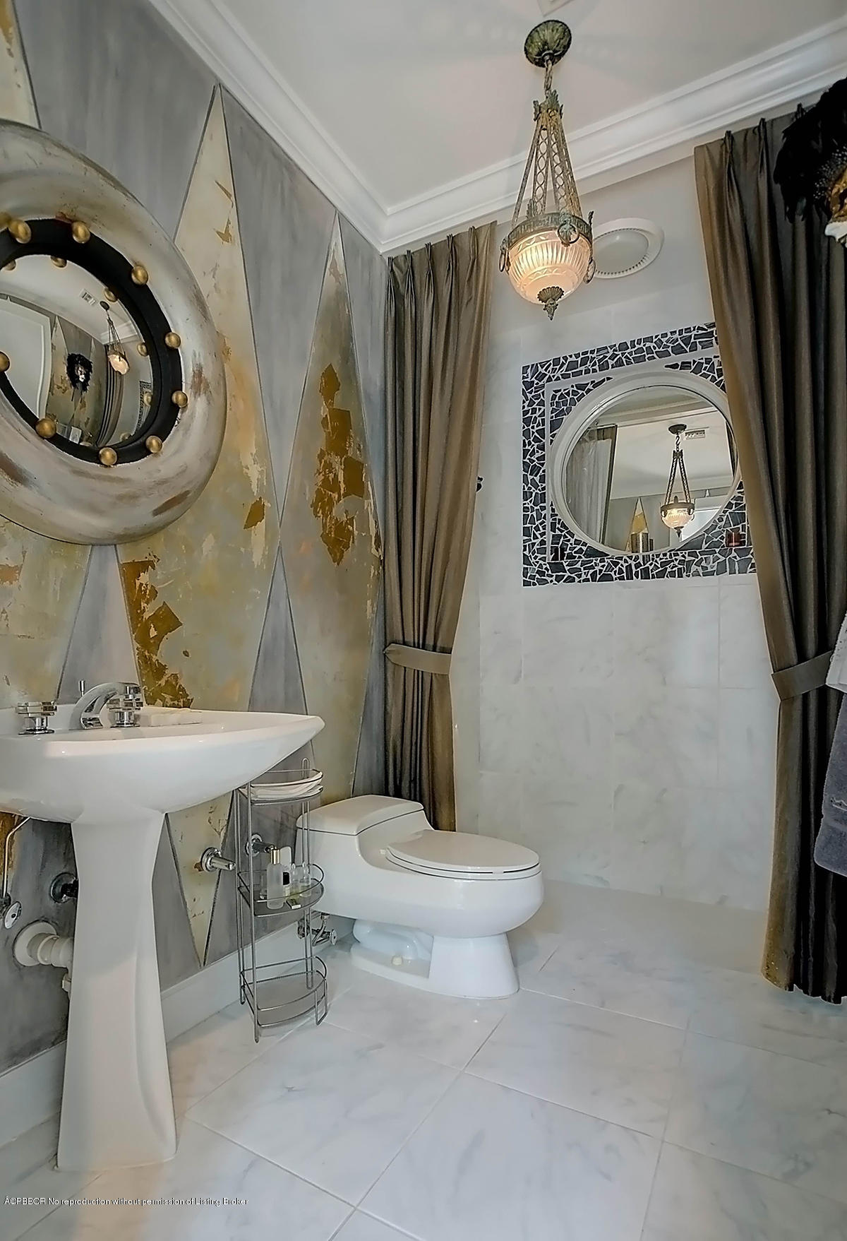 2570 Hampton Bridge Road Delray Beach, FL 33445 - Photo 27 of 40 a bathroom with a sink a toilet and a mirror