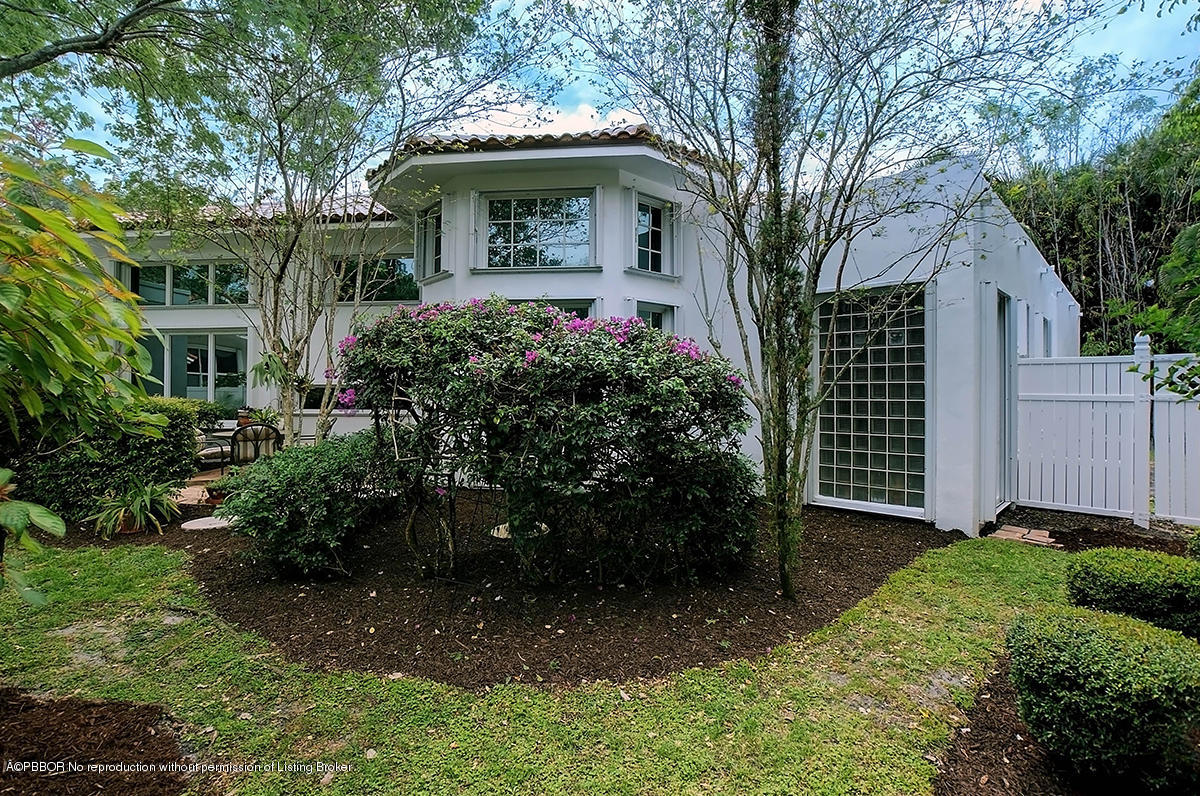 2570 Hampton Bridge Road Delray Beach, FL 33445 - Photo 38 of 40 a front view of a house with garden