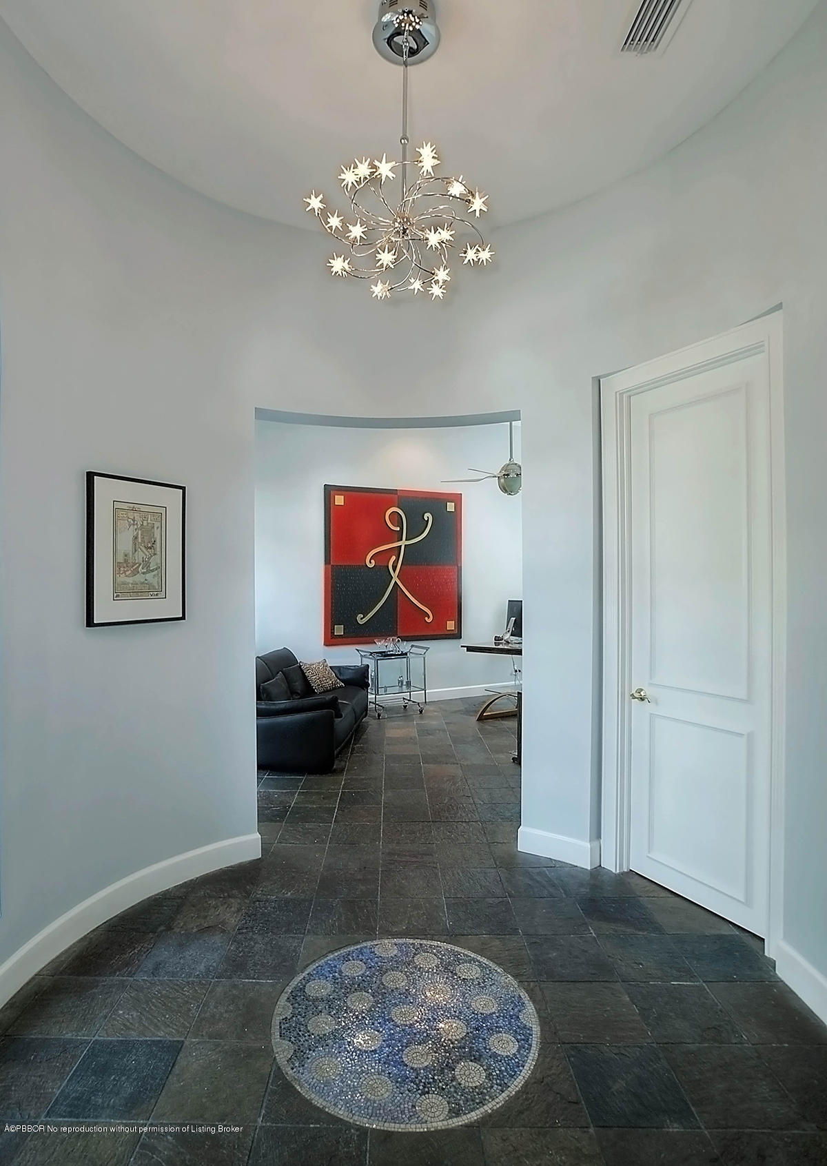 2570 Hampton Bridge Road Delray Beach, FL 33445 - Photo 6 of 40 a view of a livingroom with furniture and chandelier fan