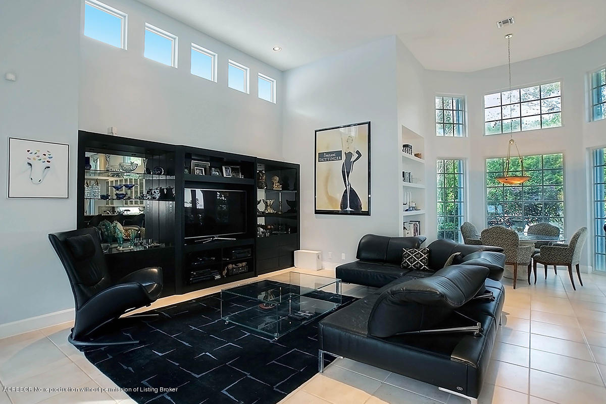 2570 Hampton Bridge Road Delray Beach, FL 33445 - Photo 10 of 40 a living room with furniture and a fireplace
