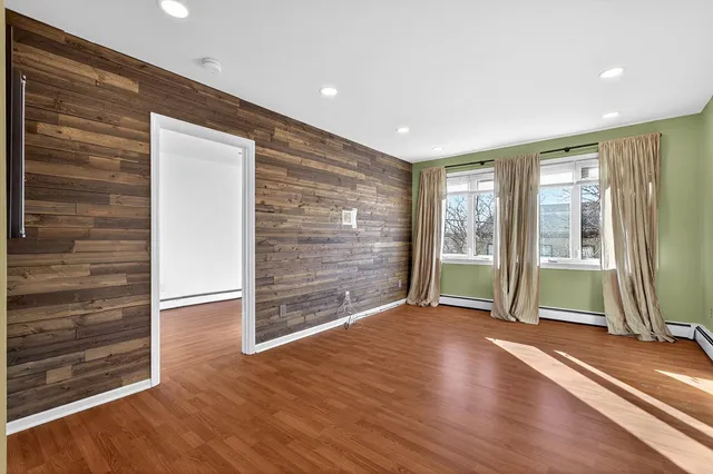 a view of livingroom with wooden floor