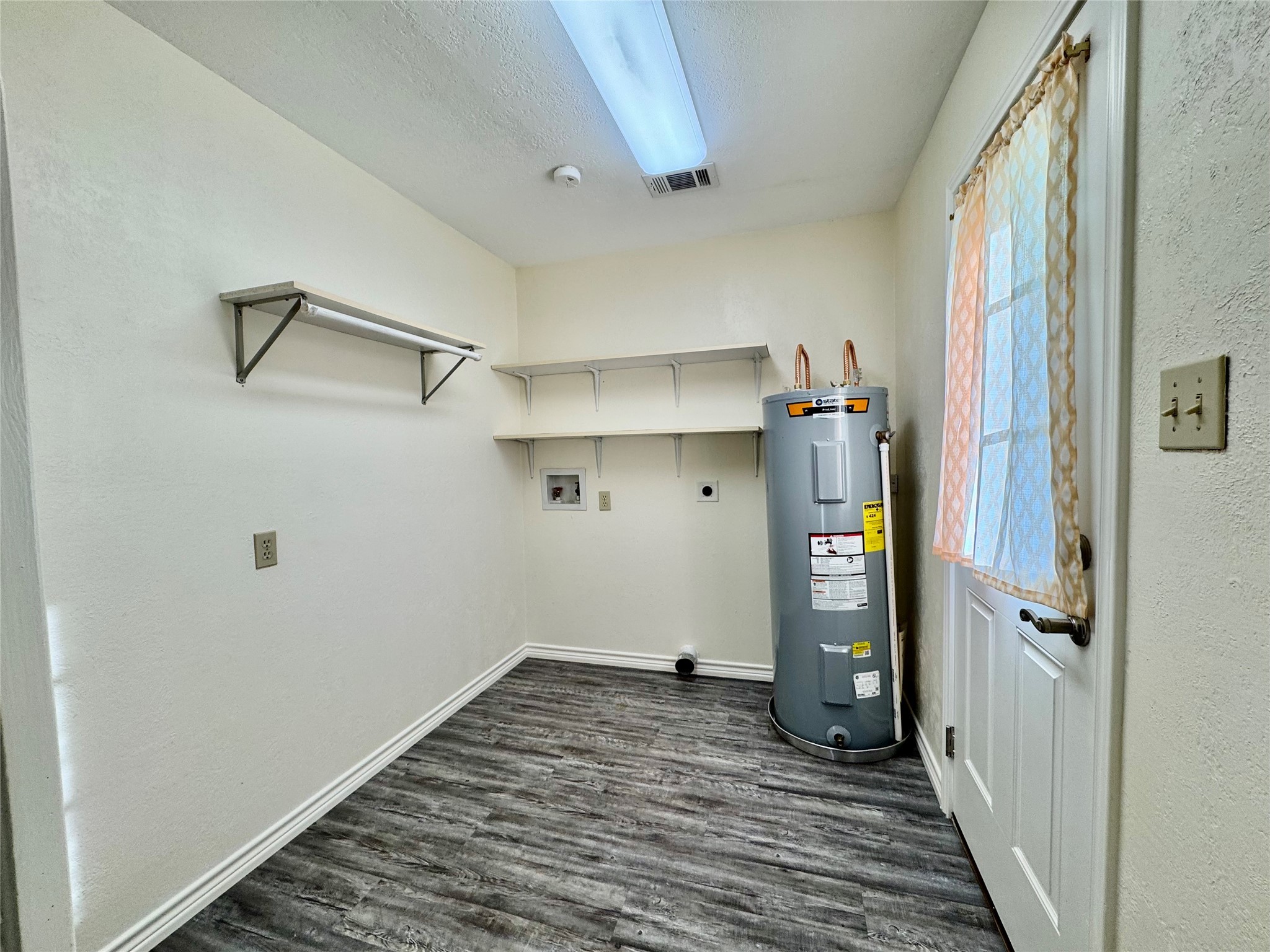 504 Timber Bay Drive Trinity, TX 75862 - Photo 20 of 48 Utility Room with door leading to back yard