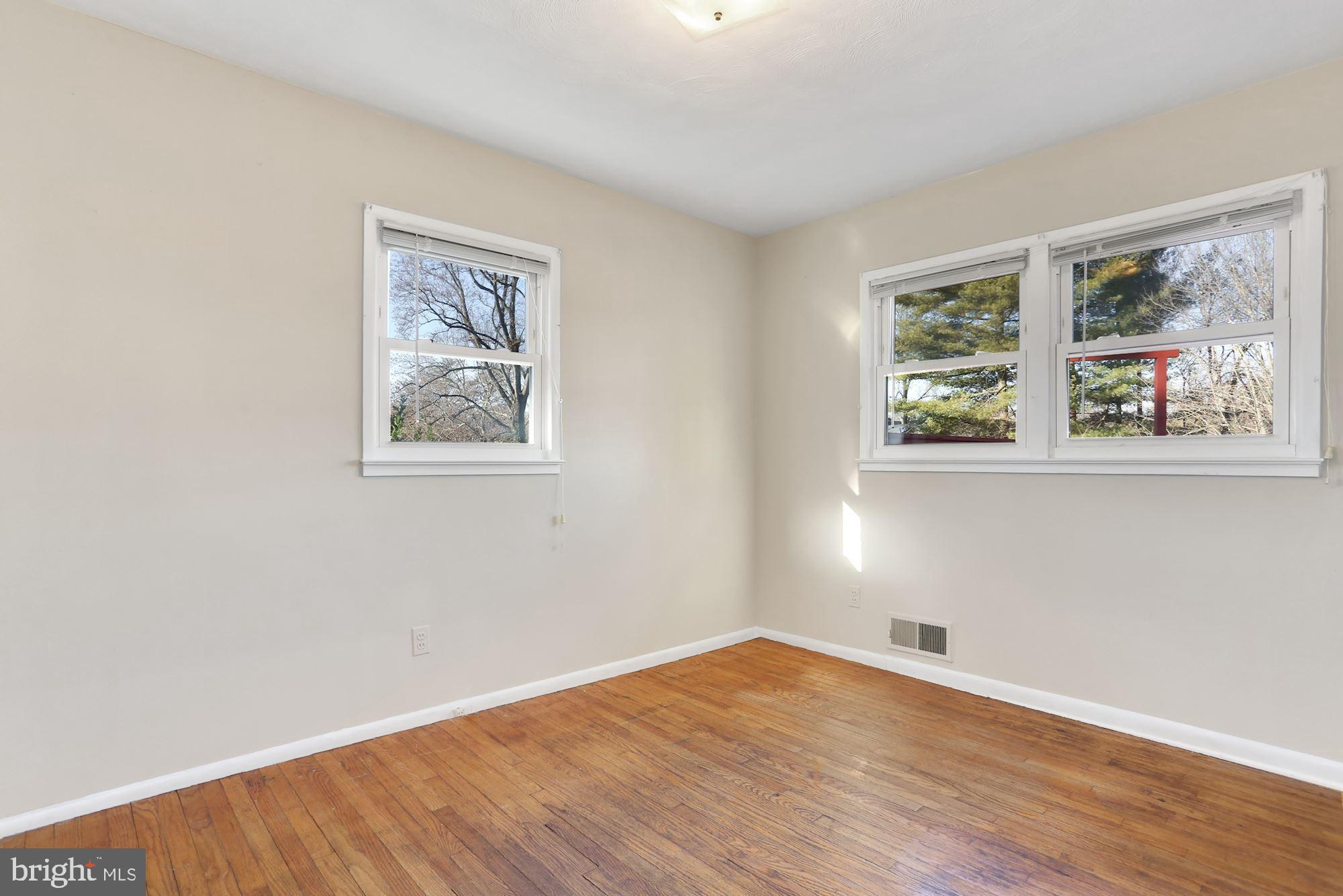 2032 Greenwich Street Falls Church, VA 22043 - Photo 11 of 26 a view of empty room with wooden floor and fan