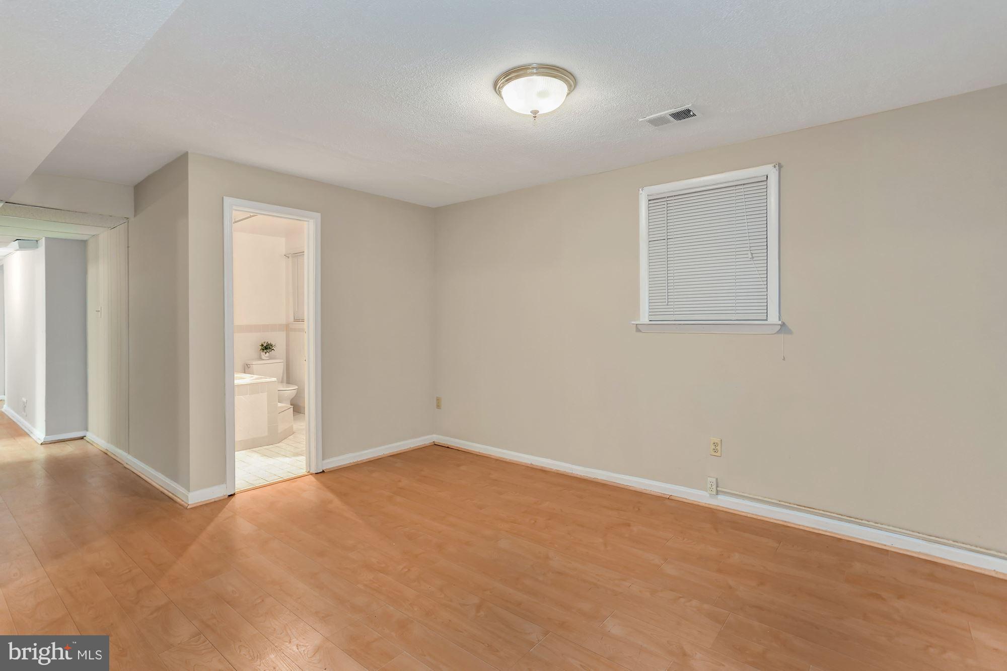 2032 Greenwich Street Falls Church, VA 22043 - Photo 18 of 26 a view of an empty room with a window