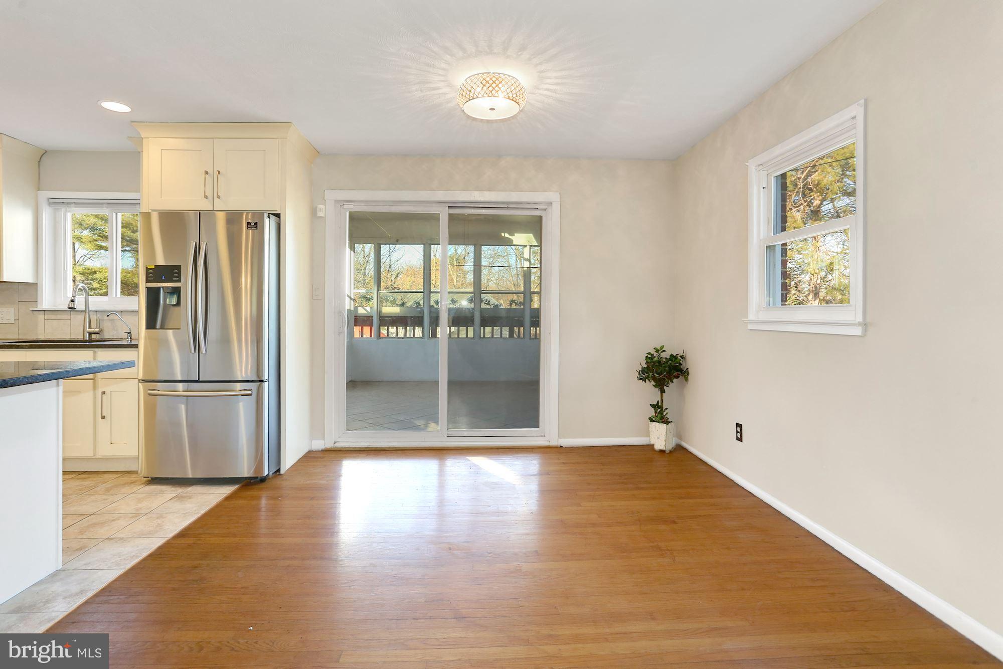 2032 Greenwich Street Falls Church, VA 22043 - Photo 10 of 26 a view of empty room with wooden floor and window