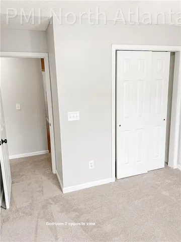 a bathroom with a sink a toilet and vanity