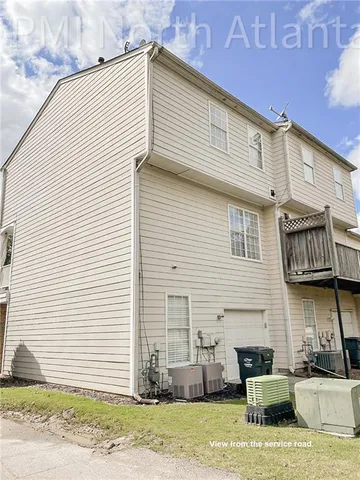 a view of a park with large tree