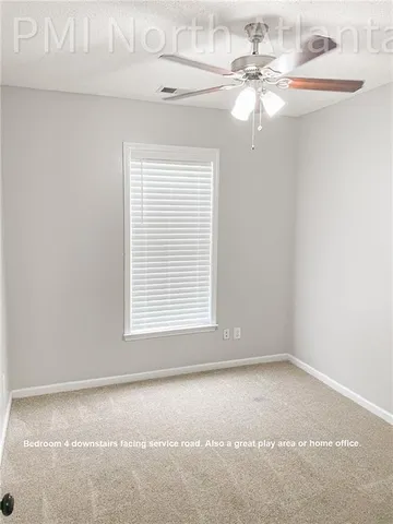 a view of a room that has a window in it