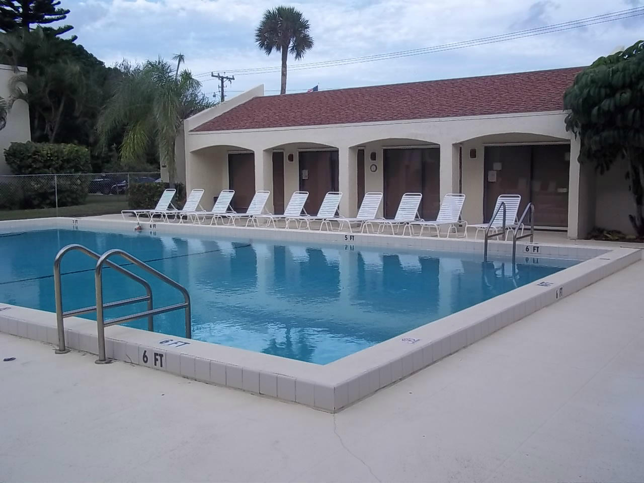 150 Pineview Road, Unit G1 Jupiter, FL 33469 - Photo 11 of 11 community pool and clubhouse