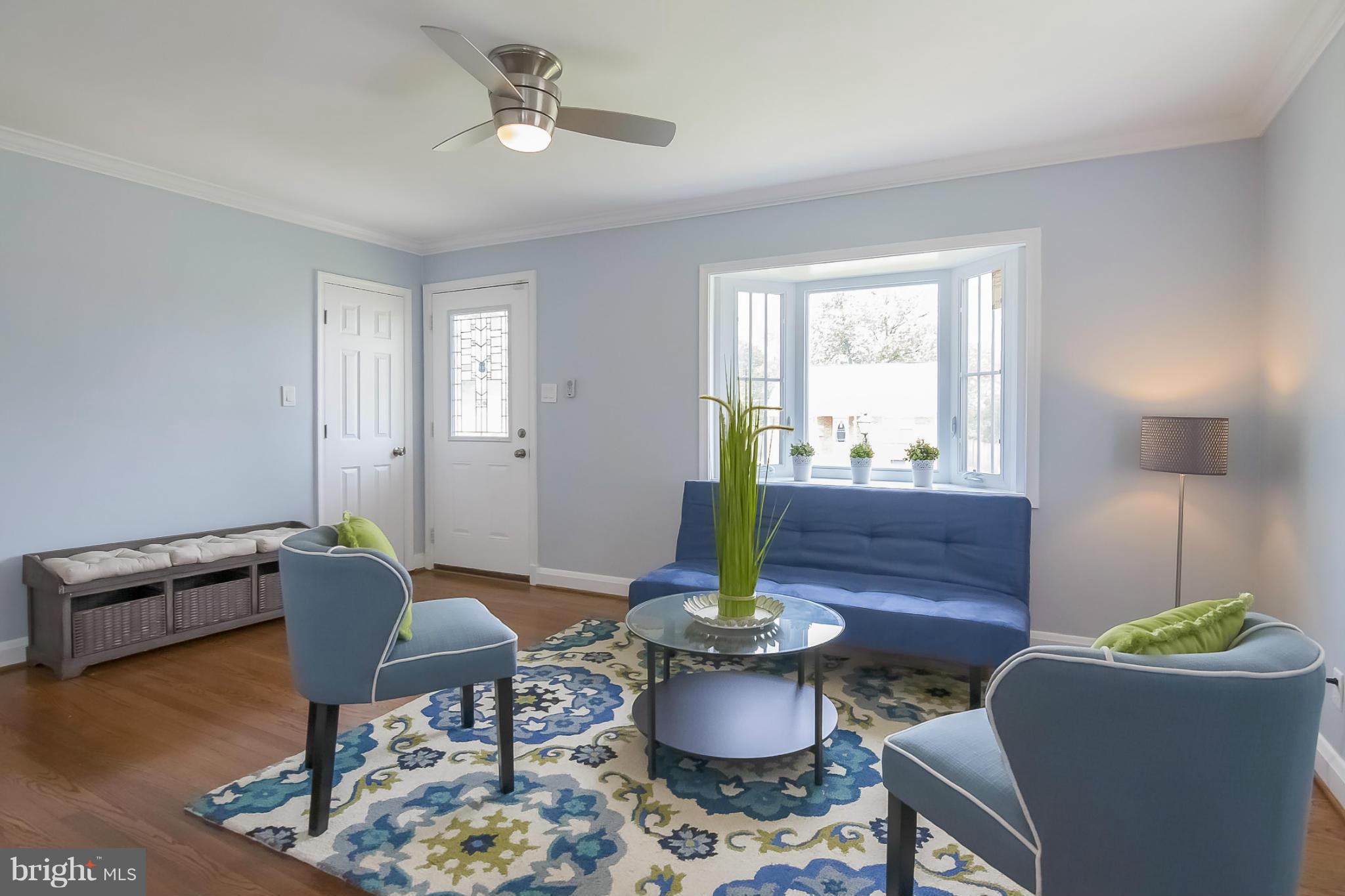 3495 Hillsmere Road Baltimore, MD 21207 - Photo 4 of 19 a living room with furniture and a window