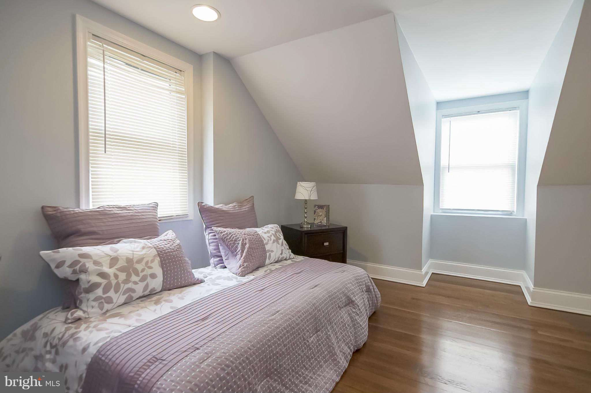 3495 Hillsmere Road Baltimore, MD 21207 - Photo 7 of 19 a bedroom with a bed and a window