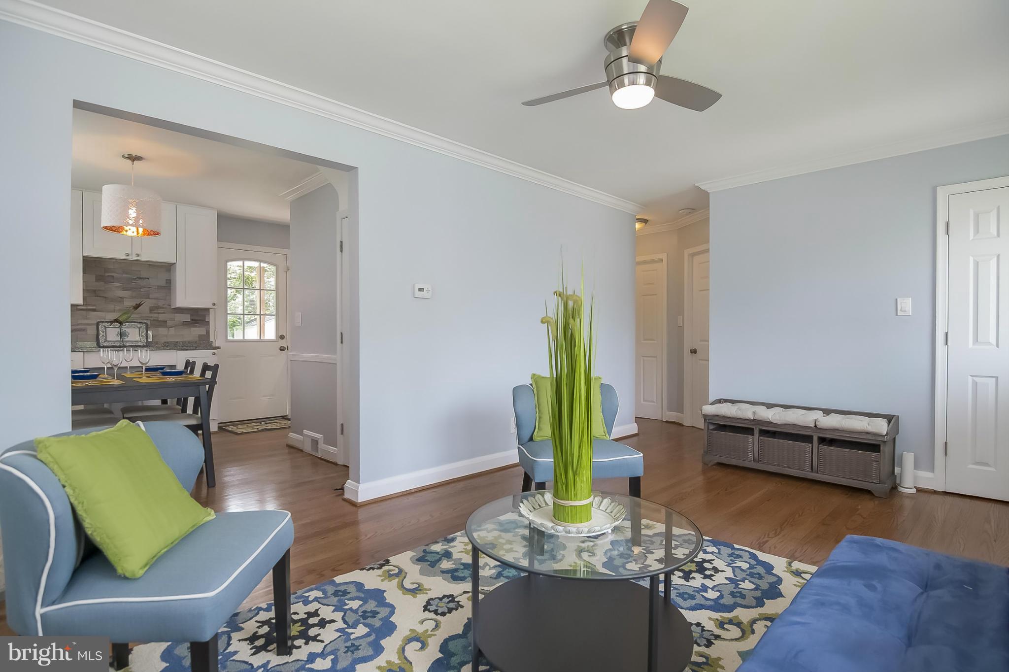 3495 Hillsmere Road Baltimore, MD 21207 - Photo 10 of 19 a living room with furniture and a rug