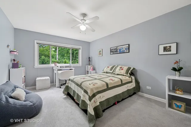 a bed room with a bed and a couch