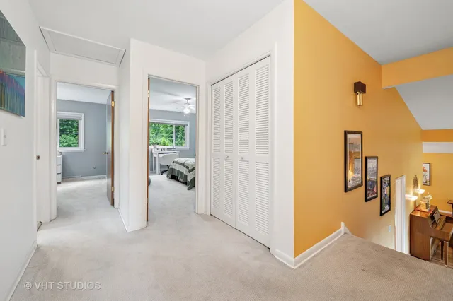 a view of a livingroom with furniture and front door