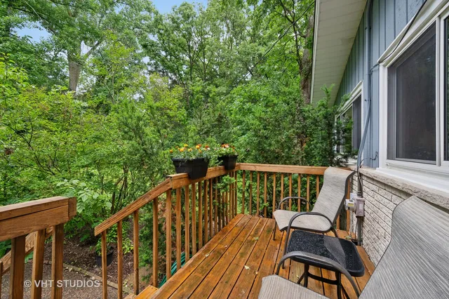 a view of balcony with furniture