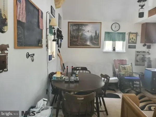 a room with a table and a window