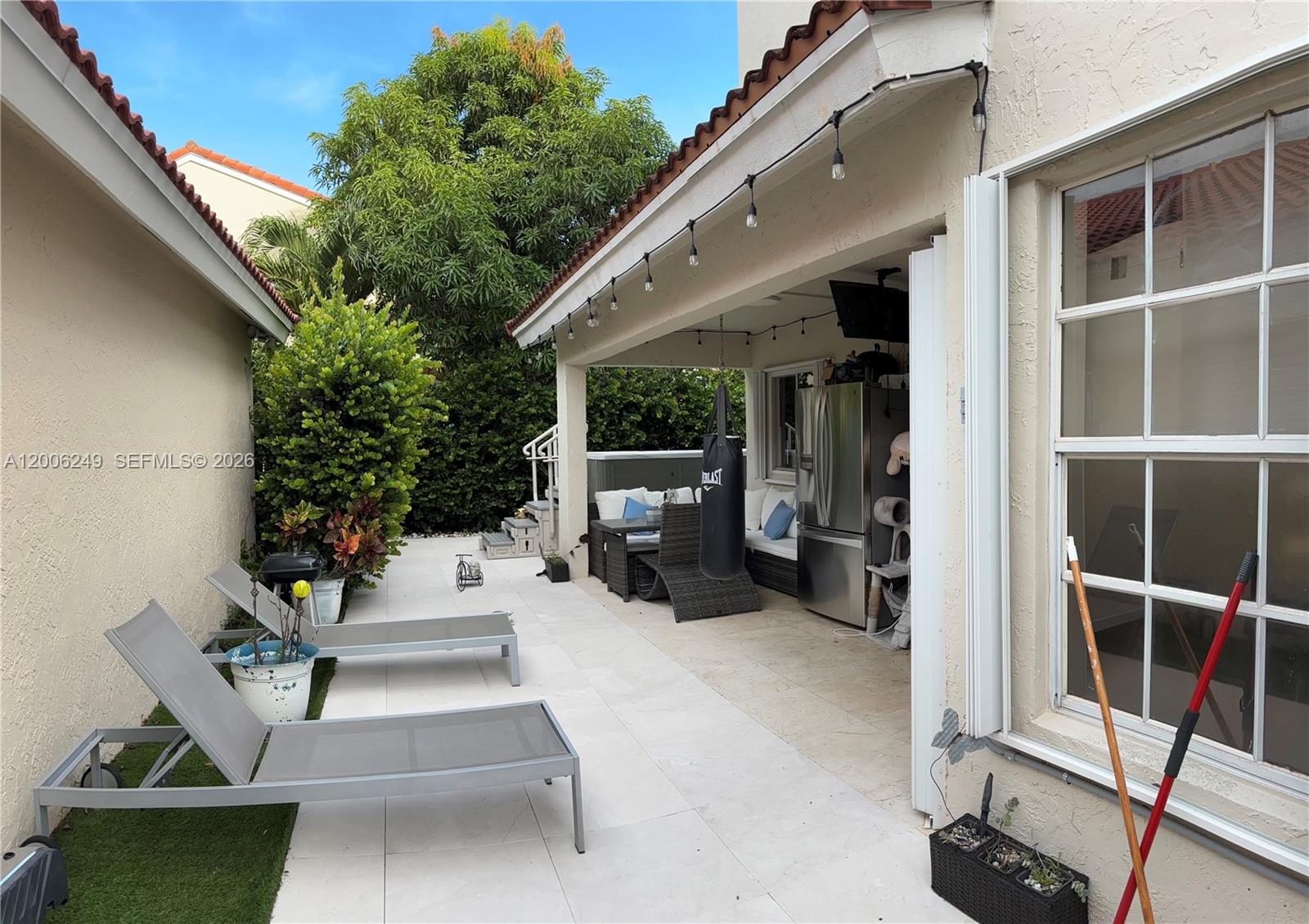 1351 Garden Road Weston, FL 33326 - Photo 20 of 20 a view of outdoor space with seating and green space