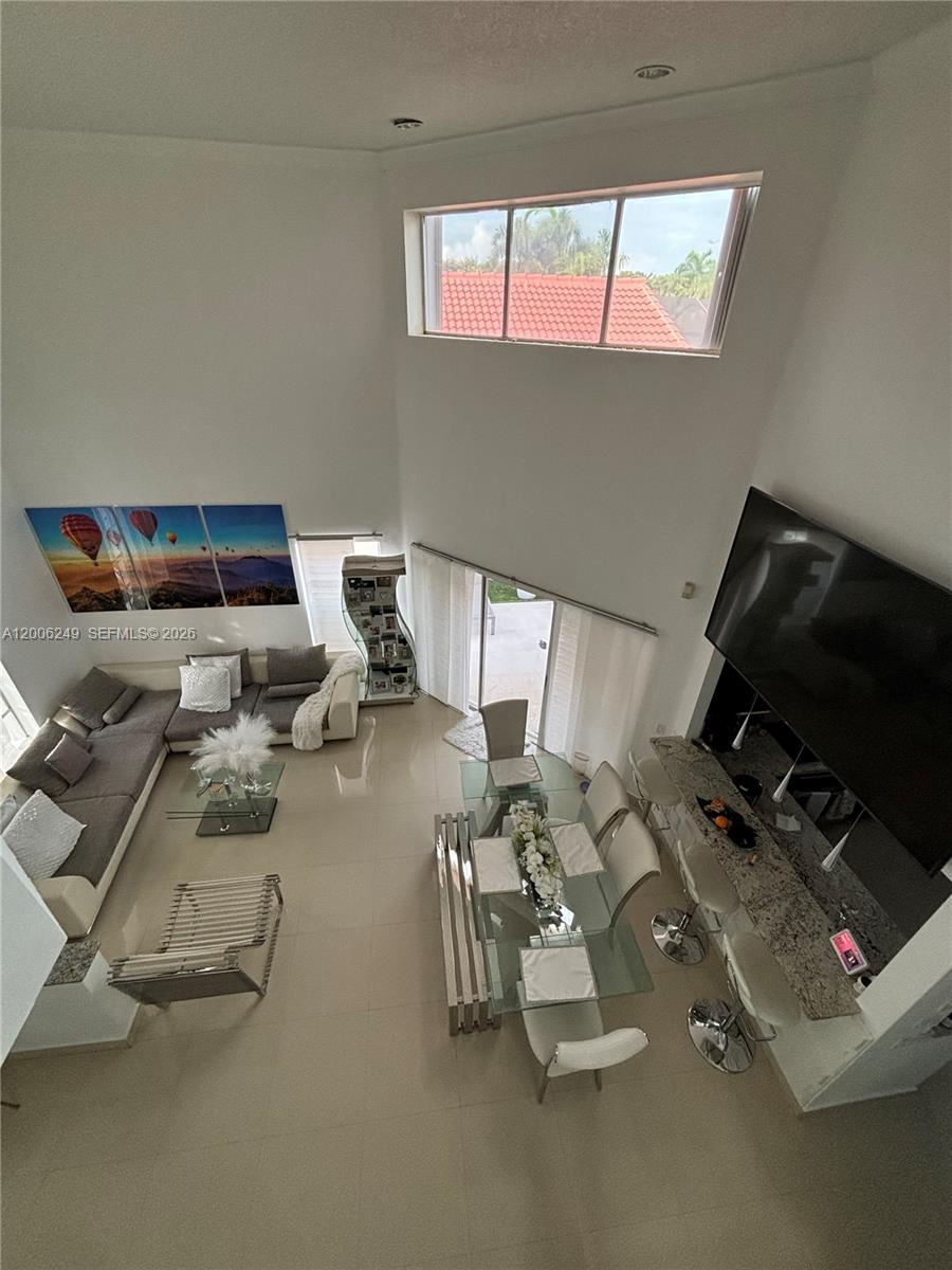 1351 Garden Road Weston, FL 33326 - Photo 8 of 20 a view of a room with gym equipment