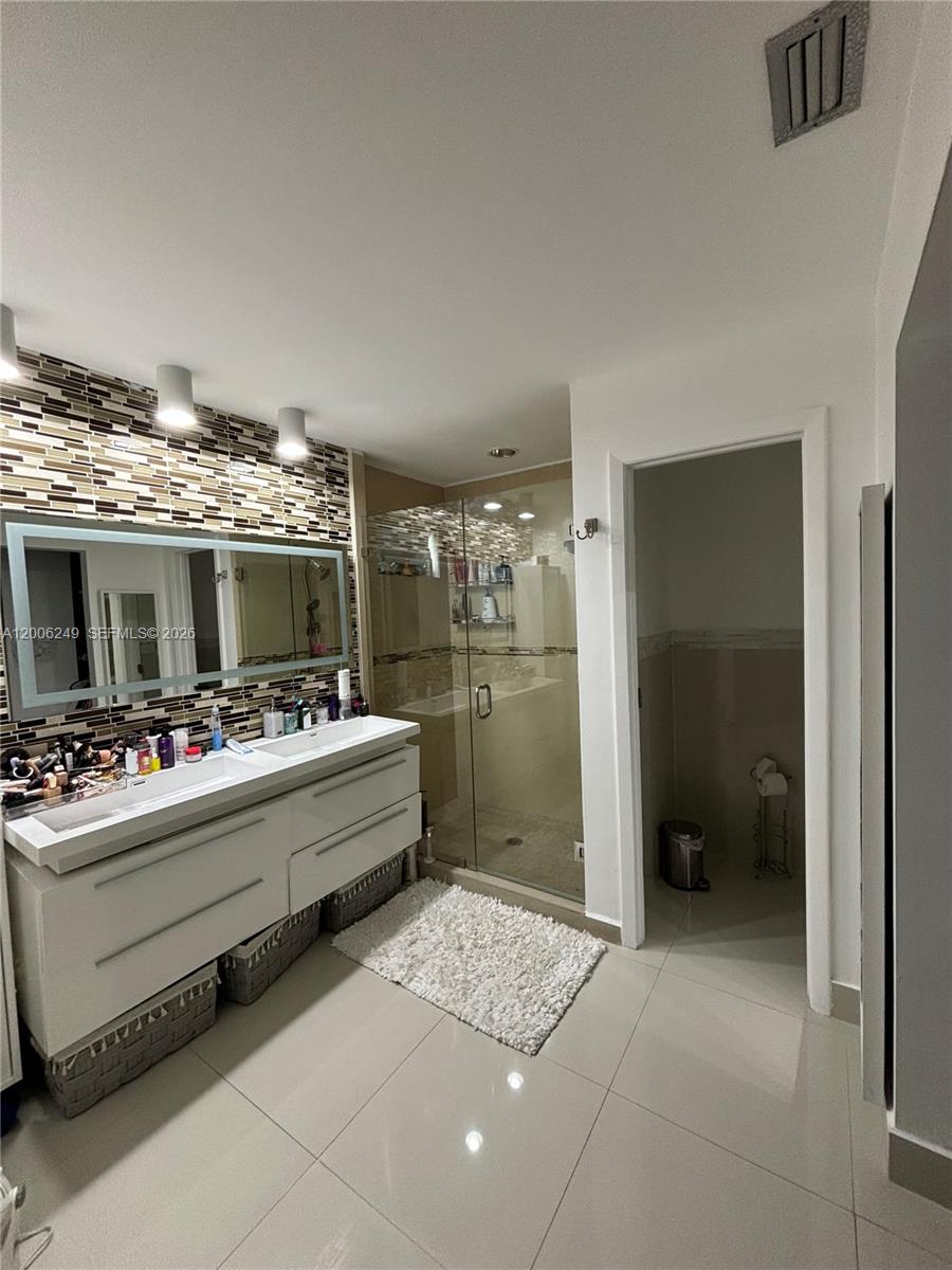 1351 Garden Road Weston, FL 33326 - Photo 9 of 20 a view of living room and washer and dryer