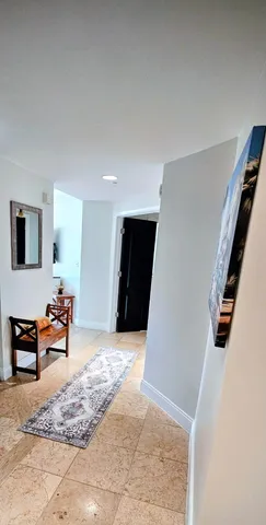 a kitchen with a sink stove and microwave