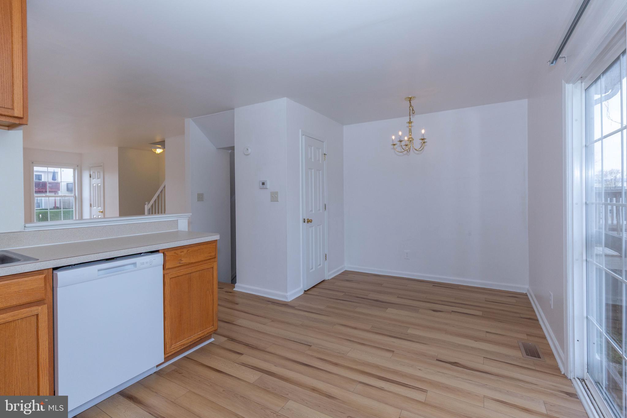 124 Pony Circle Martinsburg, WV 25405 - Photo 12 of 28 wooden floor in an empty room with a window