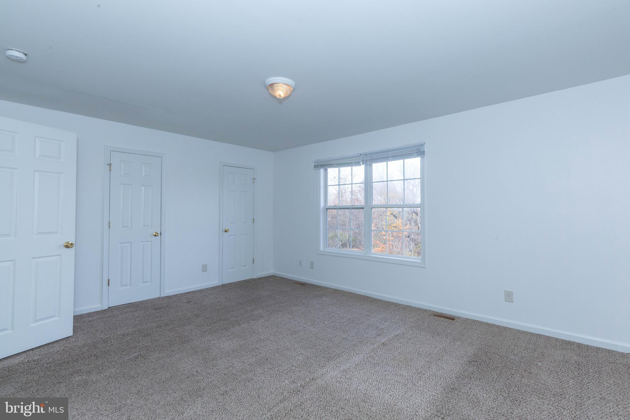 124 Pony Circle Martinsburg, WV 25405 - Photo 18 of 28 a view of an empty room with a window